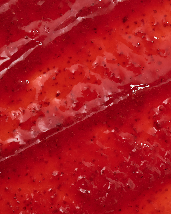 Close-up of a red strawberry spread with visible seeds