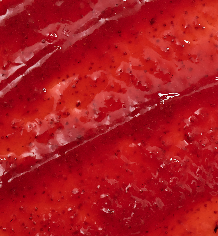 Close-up of a red strawberry spread with visible seeds