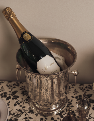 A bottle of As ever Brut champagne. 
