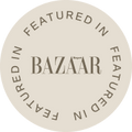 Round beige sticker with 'Featured in Harper's Bazaar' text