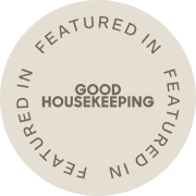 Circular badge with 'Good Housekeeping' text on a white background