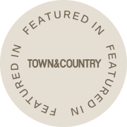 Circular sticker with 'Featured in Town & Country' text on a white background